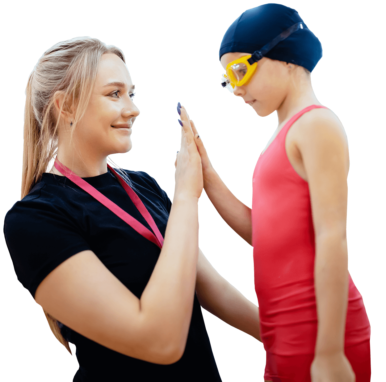 Swim coach giving a high five to a young swimmer.
