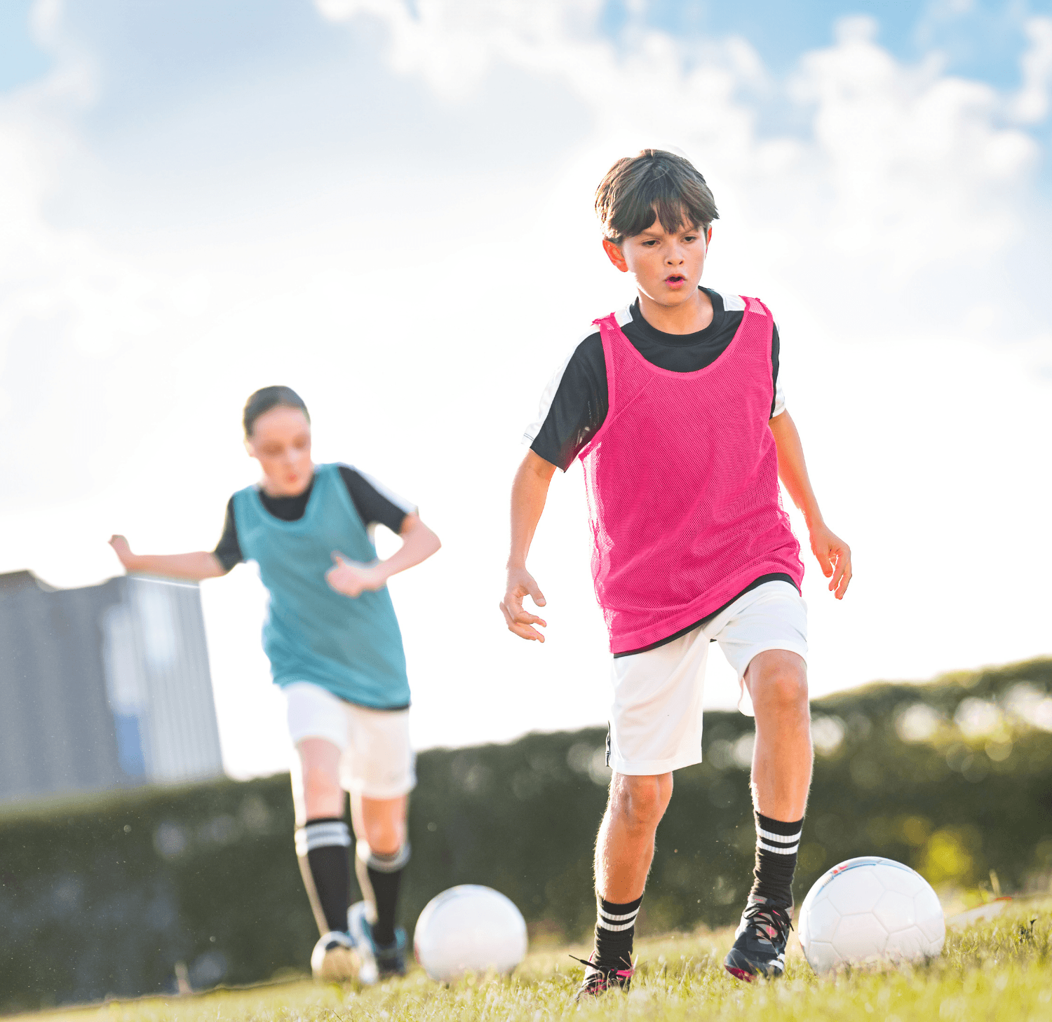 children playing soccer