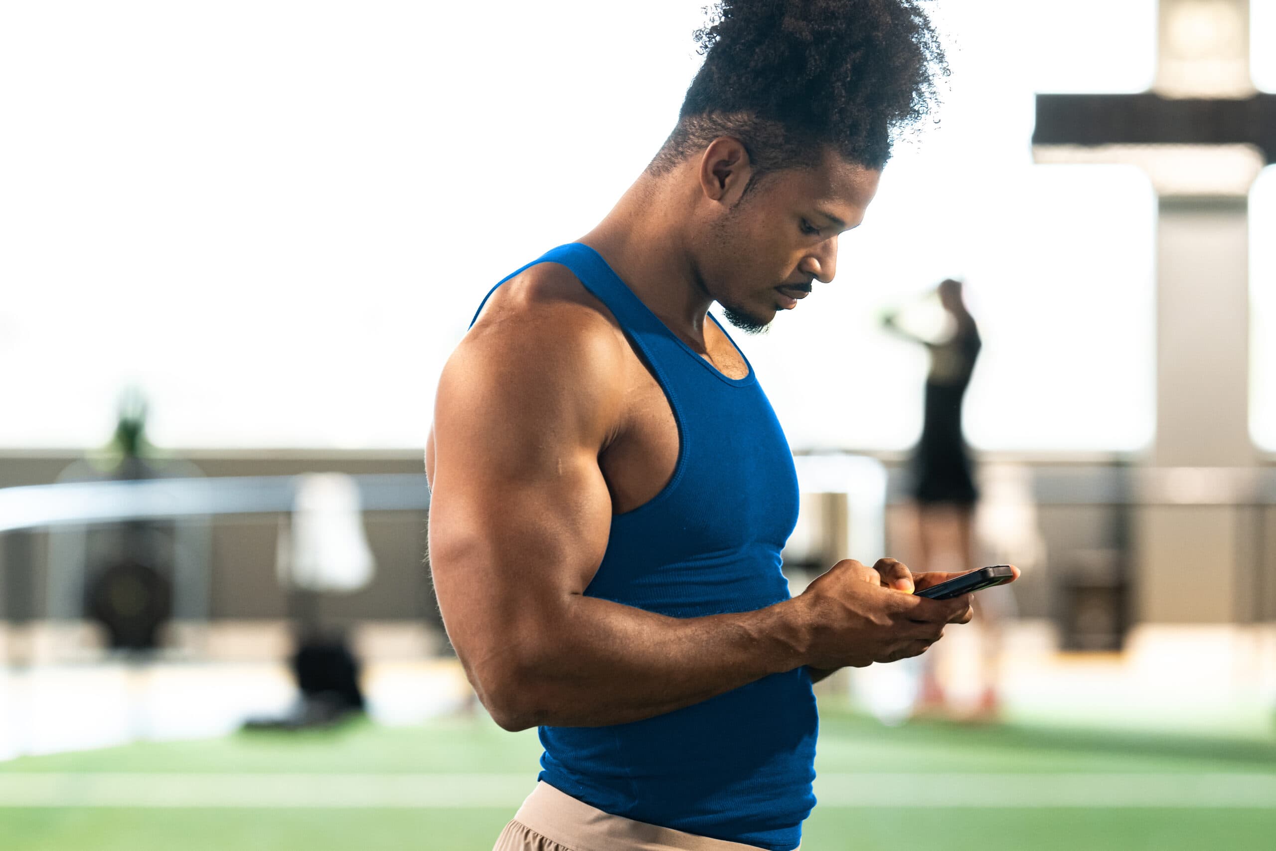 Member using a mobile check-in app at a YMCA facility